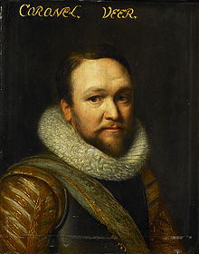 Head and shoulders portrait of a man in 17th century military attire.  He wears a breastplate and a thick, fur collar.  He has a short, brown beard and mustache and a very slight smile.