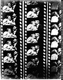 Three black-and-white film strips showing a woman and man facing each other and then eventually kissing. Each film strip has about five visible frames.