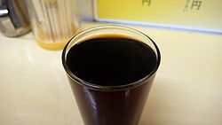 Shaoxing wine in a glass by udono in Tokyo.jpg